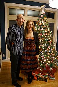 Jay and Kelly in front of the tree.